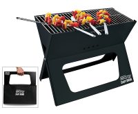 BBQ Croc foldable charcoal X-style grill assembled with the grill lifter in place and three BBQ Croc Zig Zag Skewers cooking on the grill, on the lower left in a square is a photo of the grill folded and being carried like a briefcase, all on white background.