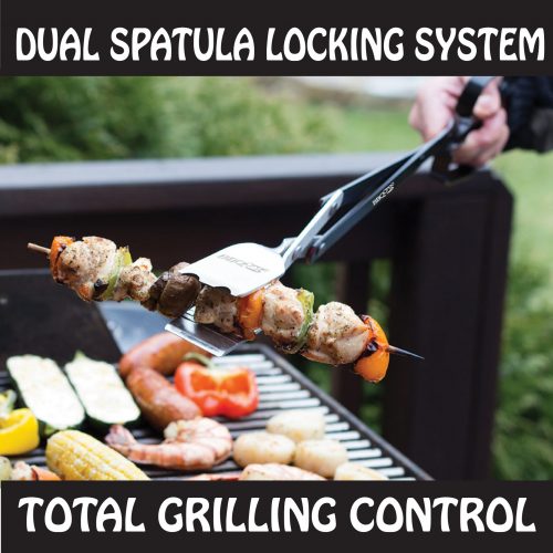 A person uses a BBQ Croc tongs with dual spatula locking system to grill food, including a chicken skewers, sausages, and vegetables, on an outdoor grill. The text reads Dual Spatula Locking System and Total Grilling Control. The background shows greenery.