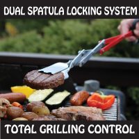 A person uses a BBQ Croc barbecue tool with tongs that make a dual spatula locking system to grill food, including a burgers, sausages, and vegetables, on an outdoor grill. The text reads Dual Spatula Locking System and Total Grilling Control. The background shows greenery.